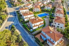 Casa adosada en Miami Playa - MASIA1 adosado con jardín privado y piscina comun