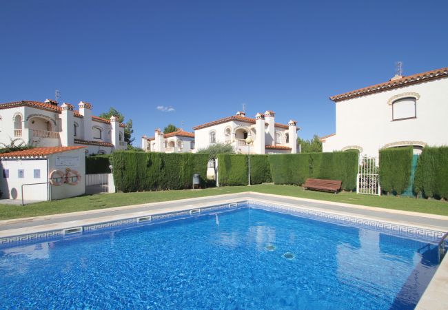 Casa adosada en Miami Playa - MASIA2 adosado jardín privado, BBQ y piscina comun Casa adosada en Miami Playa - MASIA2 adosado jardín privado, BBQ y piscina comun