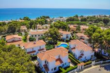 Casa adosada en Miami Playa - RIOJA Adosado jardín, BBQ, piscina y Wifi gratis