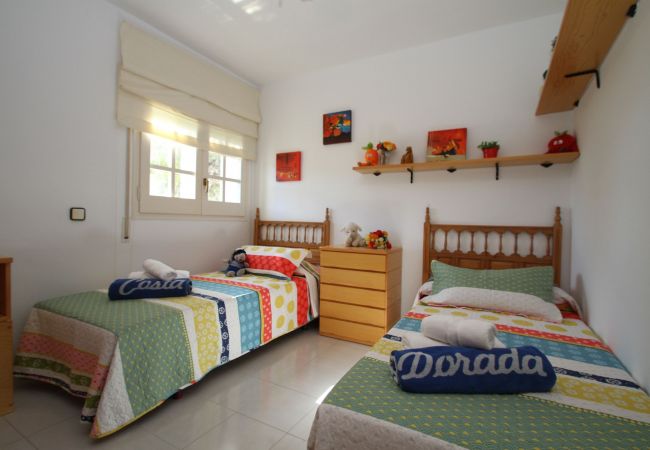 Casa adosada en Miami Playa - BEDOL1 Adosado jardín, piscina comun, WiFi gratis Casa adosada en Miami Playa - BEDOL1 Adosado jardín, piscina comun, WiFi gratis
