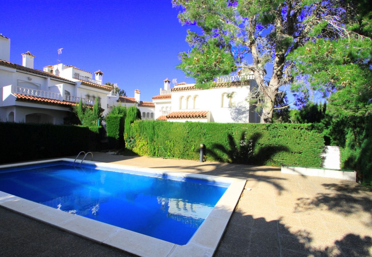 Casa adosada en Miami Playa - BEDOL1 Adosado jardín, piscina comun, WiFi gratis