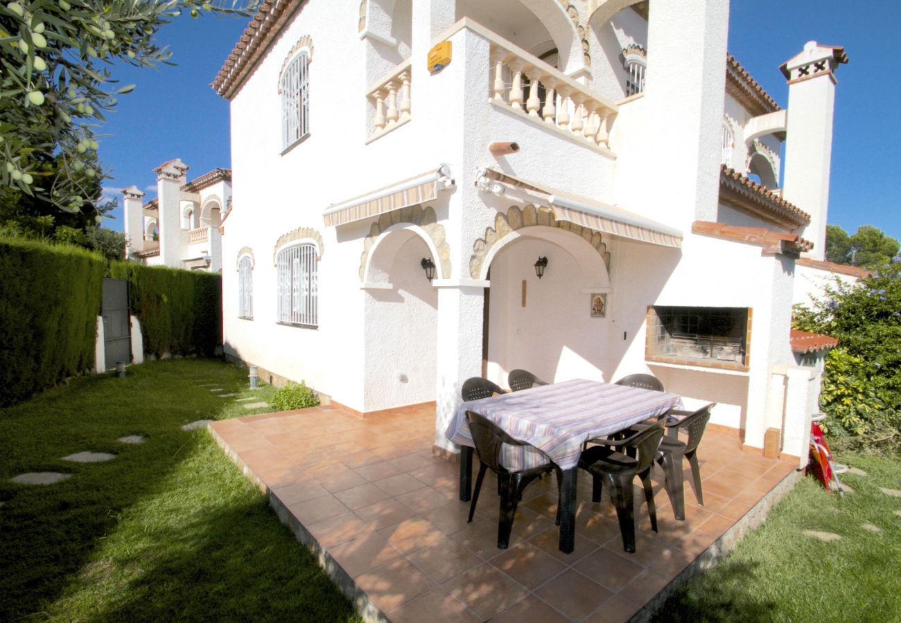 Maison mitoyenne à Miami Playa - MASIA2 adosado jardín privado, BBQ y piscina comun Maison mitoyenne à Miami Playa - MASIA2 adosado jardín privado, BBQ y piscina comun