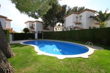 Maison mitoyenne à Miami Playa - RIOJA2 adosado con jardín, BBQ y piscina comun