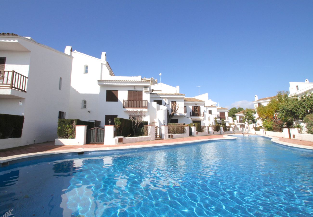 Maison mitoyenne à Miami Playa - CALETA adosado 1ª línea del mar, piscina comun