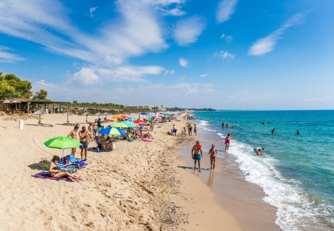 Таунхаус на Miami Playa - MASIA1 adosado con jardín privado y piscina comun Таунхаус на Miami Playa - MASIA1 adosado con jardín privado y piscina comun