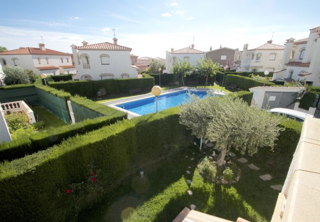 Таунхаус на Miami Playa - MASIA2 adosado jardín privado, BBQ y piscina comun Таунхаус на Miami Playa - MASIA2 adosado jardín privado, BBQ y piscina comun