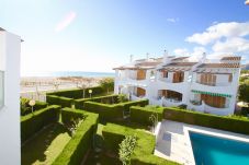 Таунхаус на Оспиталет дель Инфант - ARENAL adosado 1ª línea del mar, piscina comun